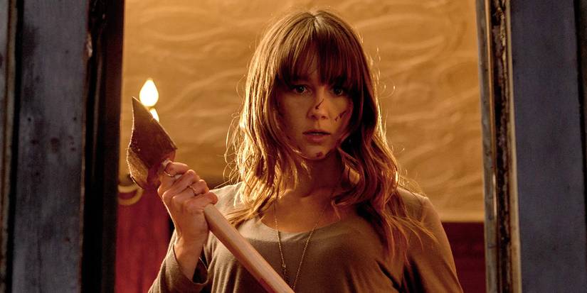 Sharni Vinson as Erin, the final girl, in You're Next (2013).