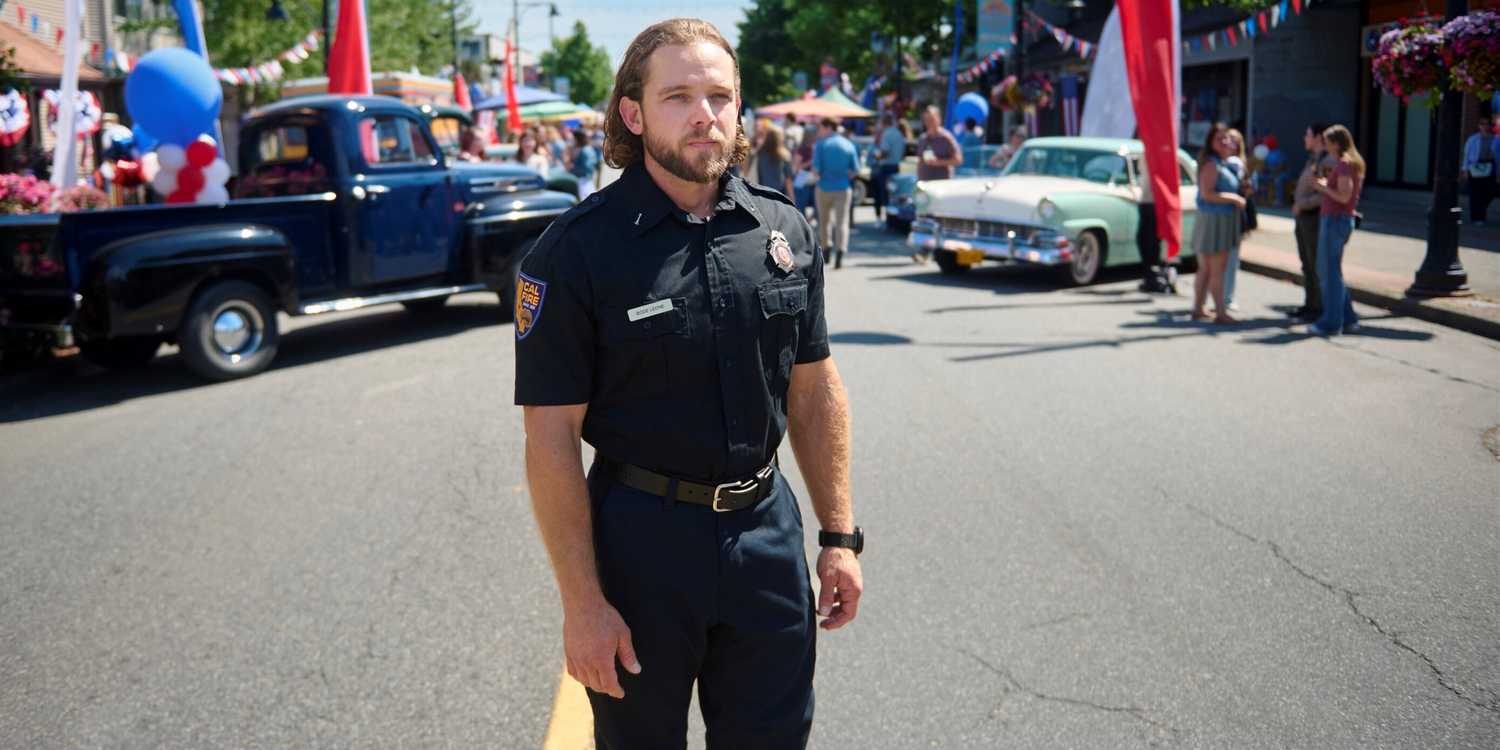 Max Thieriot in his fire uniform on Main Street at the Founders' Day festival in Fire Country Season 5