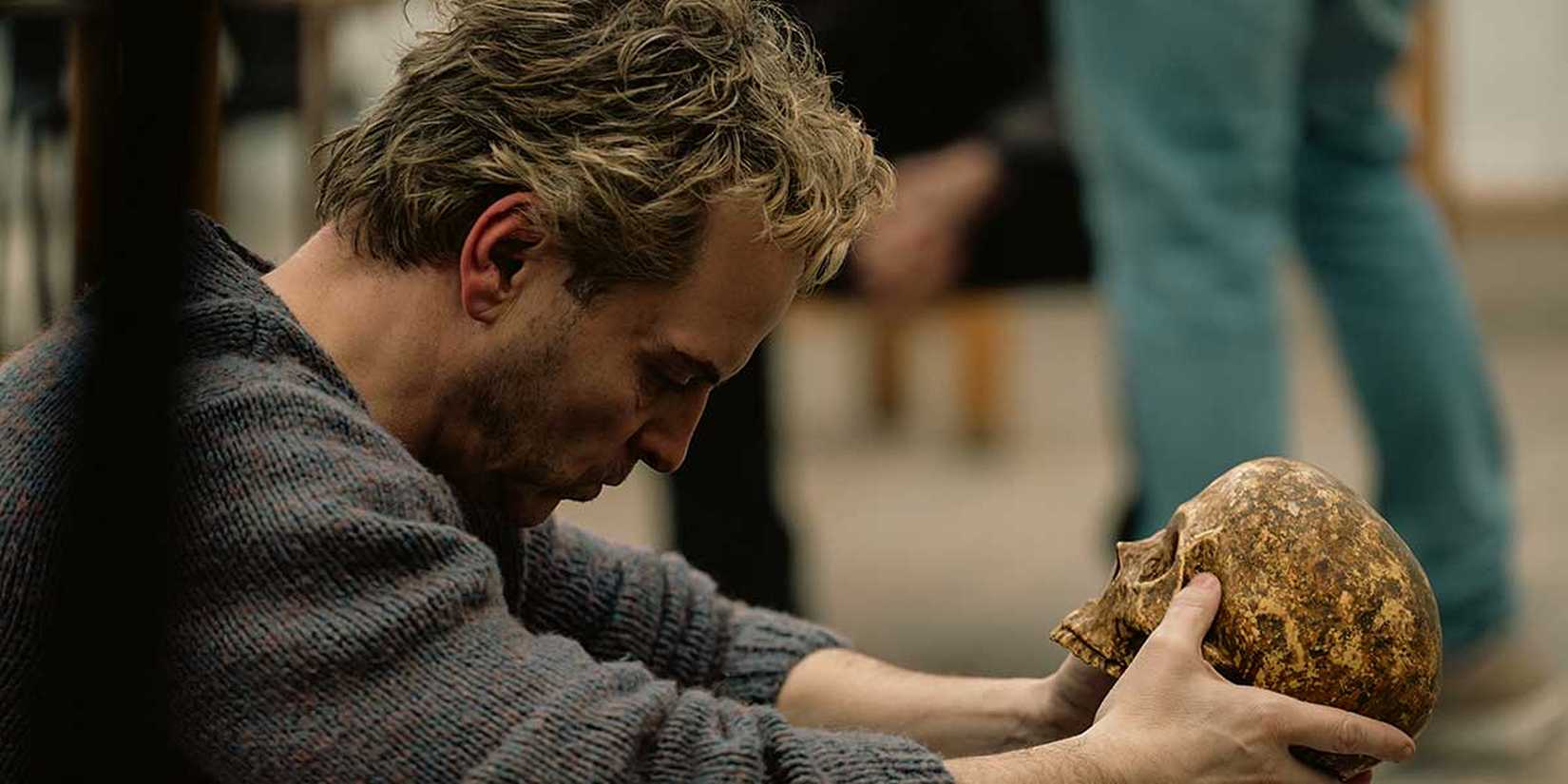 Andrew Scott as Ian Charleson holding a skull from Hamlet in Elsinore