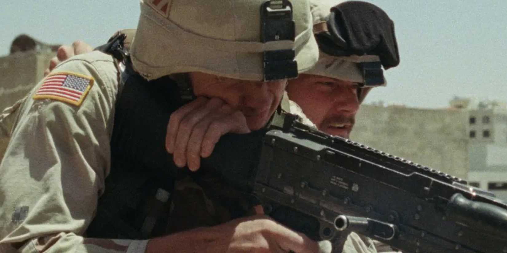 Two soldiers on the roof during a shootout on the street in Atonement
