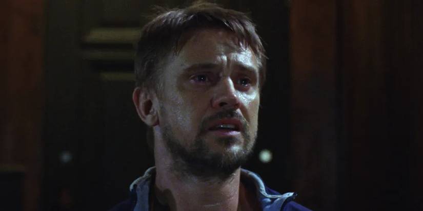 Boyd Holbrook in tears in a still from Atonement