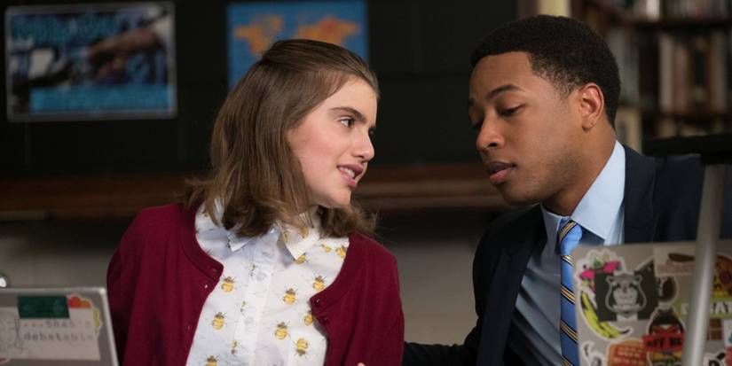 Lona and Bennet leaning in to talk to each other in Candy Jar