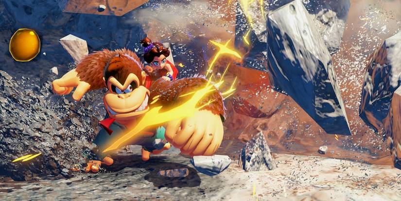 Donkey Kong smashing through terrain with Young Pauline on his back in Donkey Kong Bananza.