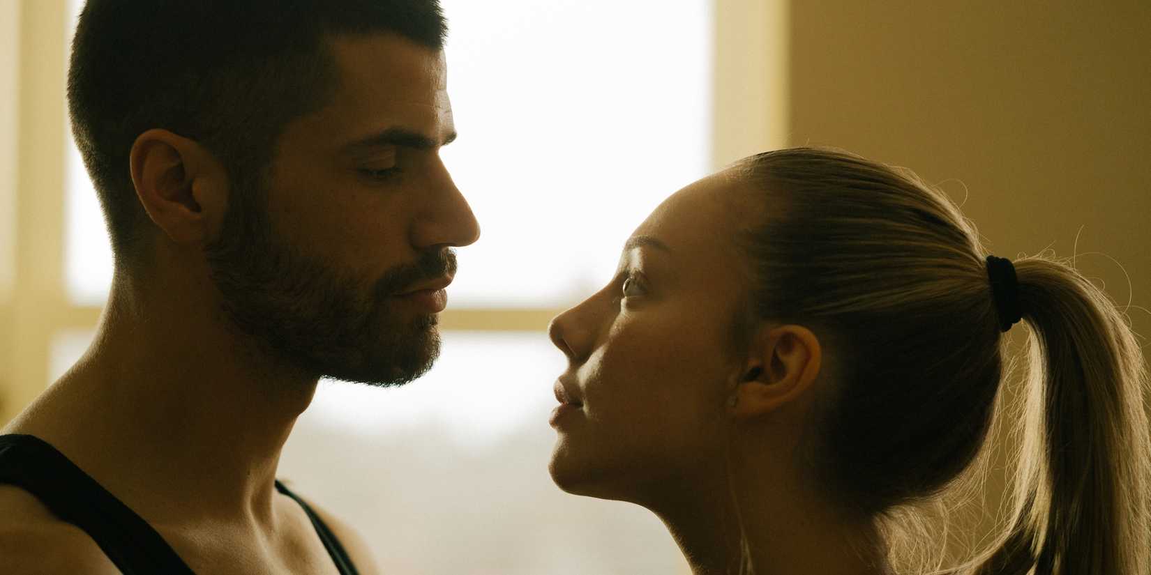 Hugo Diego Garcia as Sebastian and Ester Exposito as Marfil standing close to each other in Drawn Together