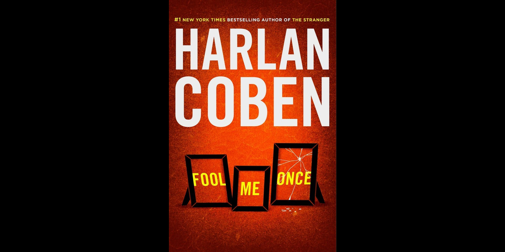 Image via A book cover for Harlan Coben’s Fool Me Once, featuring three black picture frames against an orange-red background, with the title arranged inside the frames.