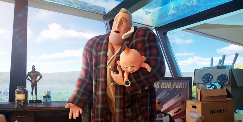 Bob holds baby Jack-Jack while talking on the phone in Incredibles 2