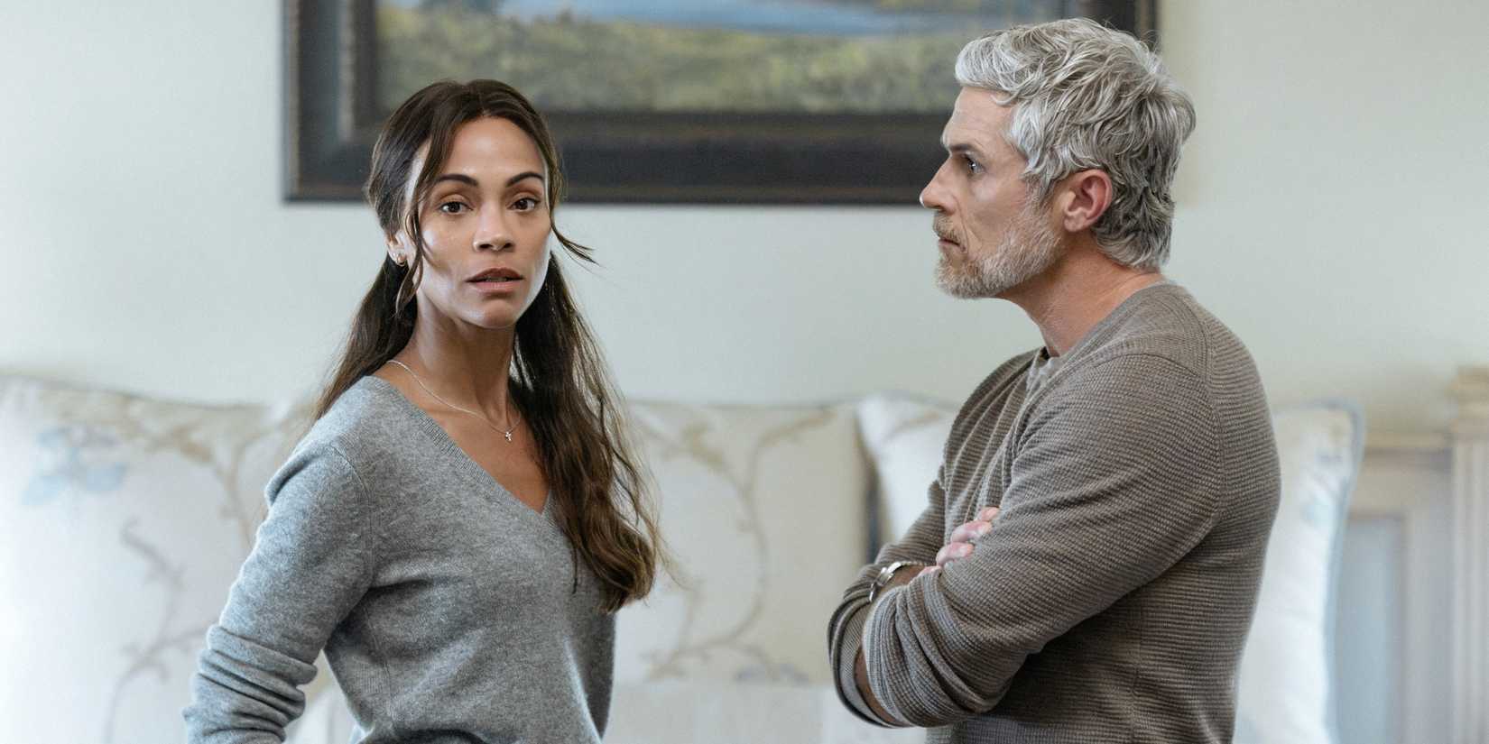 Zoe Saldaña as Joe looking away from Dave Annable as Neal while he's angry in Lioness Season 3
