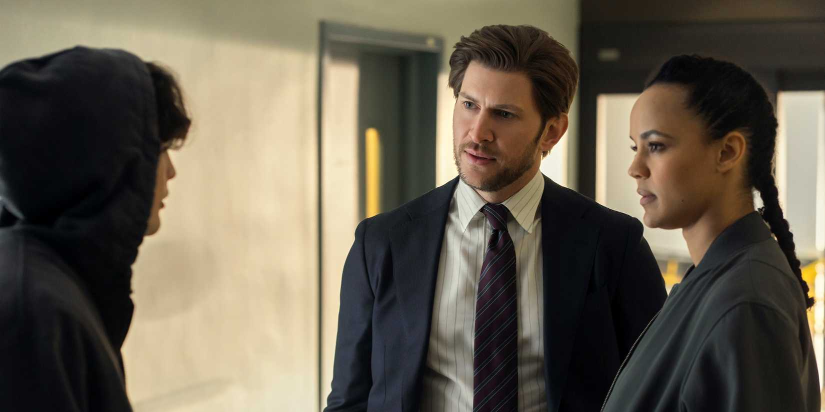 Greyston Holt as Hudson standing with Maria Sten as Frances as they talk to Jasper Jones as Keno in Neagley