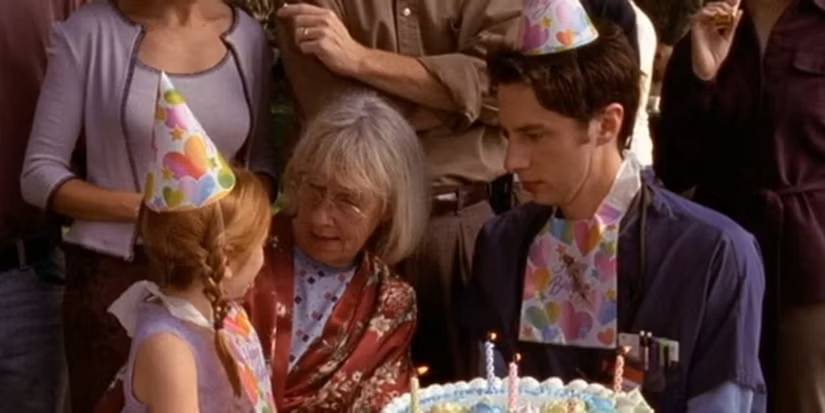Mrs. Tanner (Kathryn Joosten) and J.D. (Zach Braff) at a birthday party in 'Scrubs' Season 1 episode "My Old Lady"