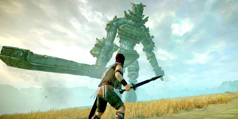 Wander facing a Colossi in Shadow of the Colossus