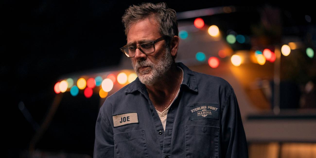Jeffrey Dean Morgan as Joe looking concerned while standing outside at night in Sterling Point