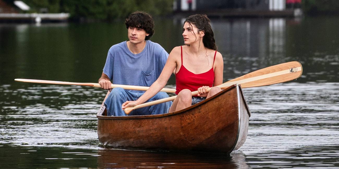 Ella Rubin as Annie sitting in a boat on the lake with Jacob Whiteduck-Lavoie as Ellis in Sterling Point