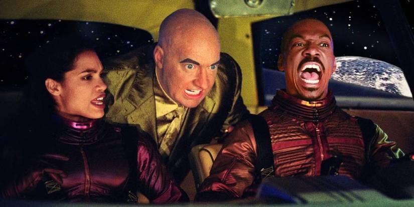 Three astronauts inside a vehicle in The Adventures of Pluto Nash