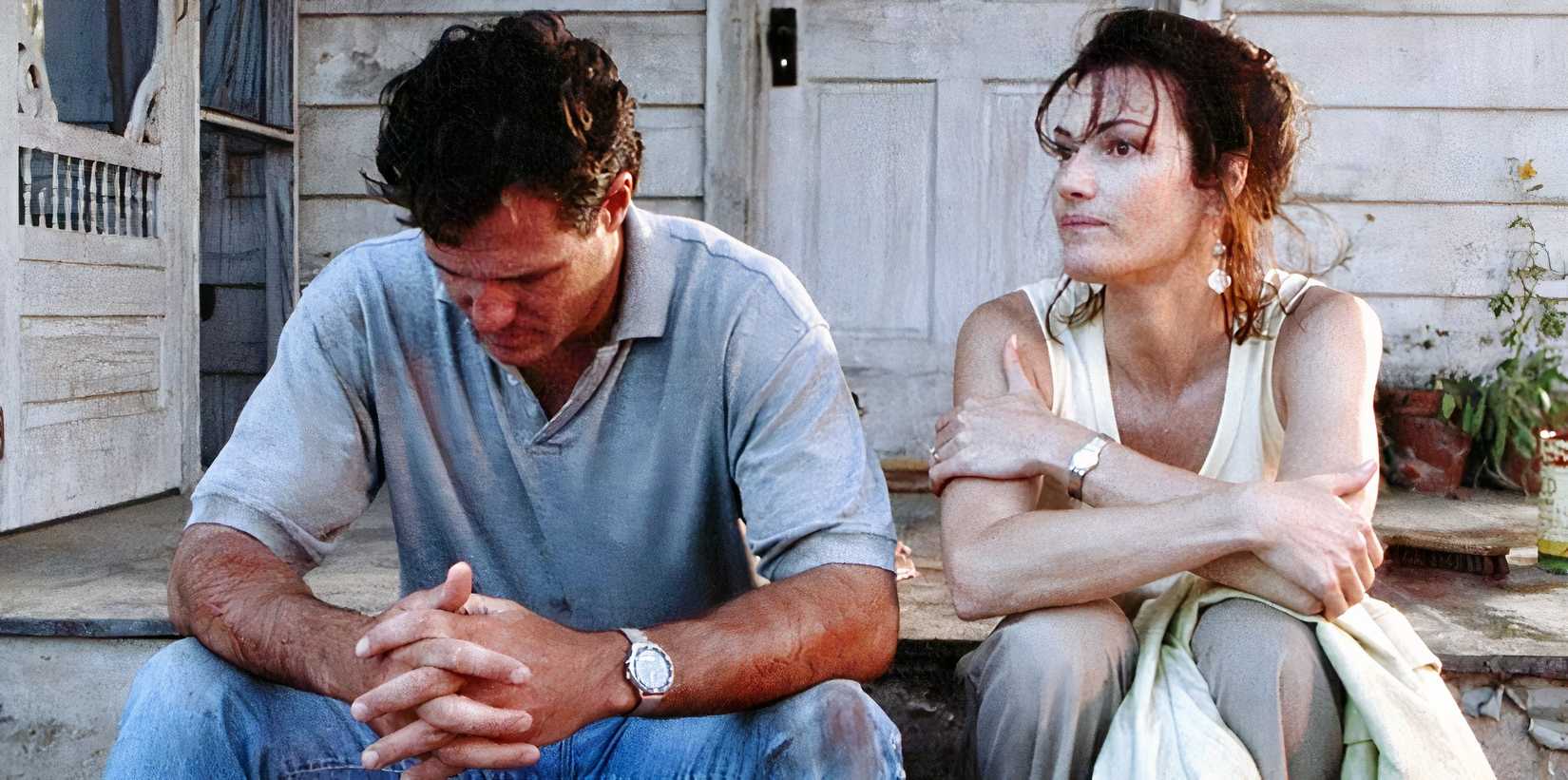 The Birds II: Land's End (1994), Brad Johnson as Ted, and Chelsea Field as May sit on their porch, contemplating life with killer birds