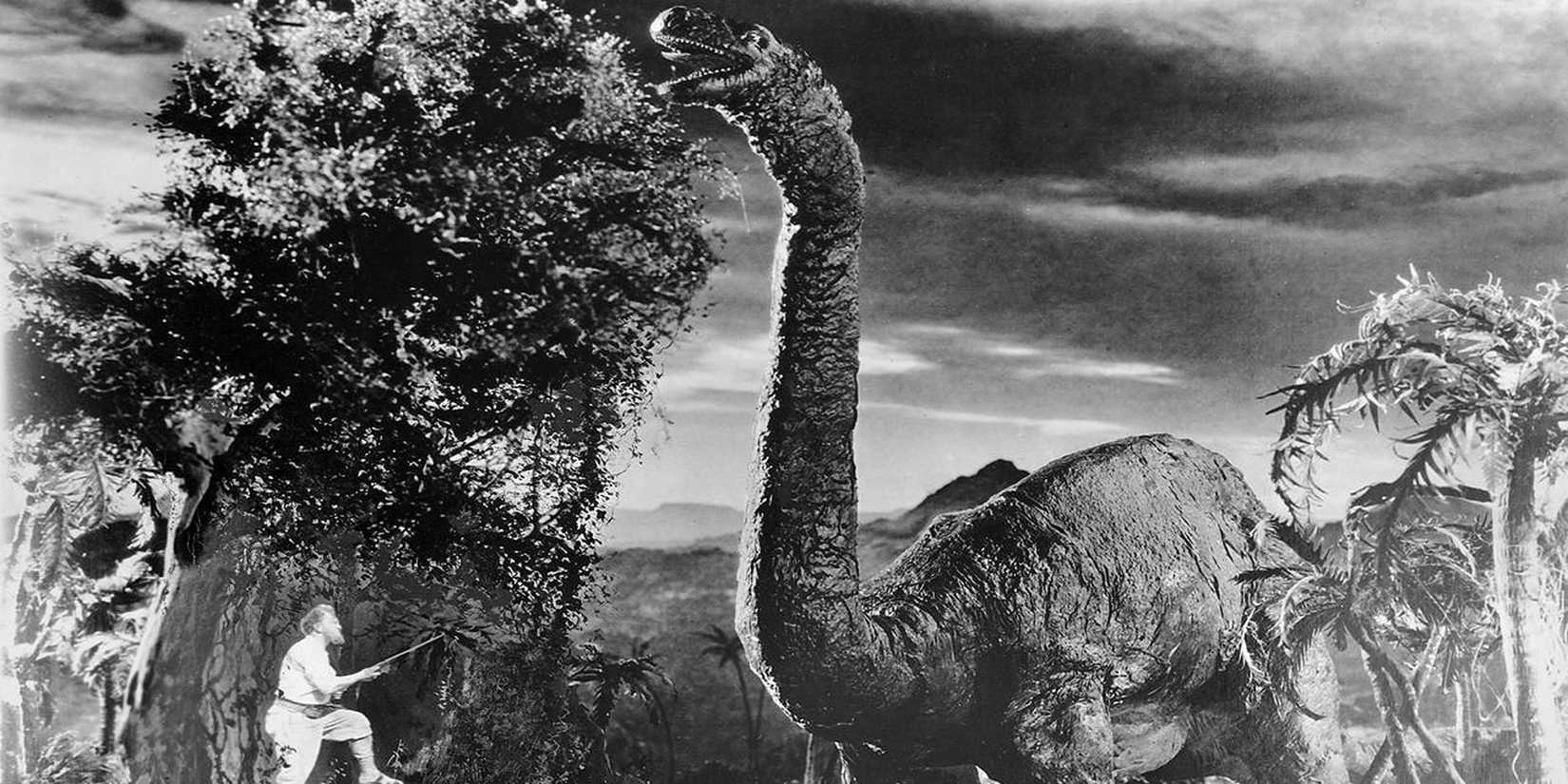 A hunter faces a Brontosaurus