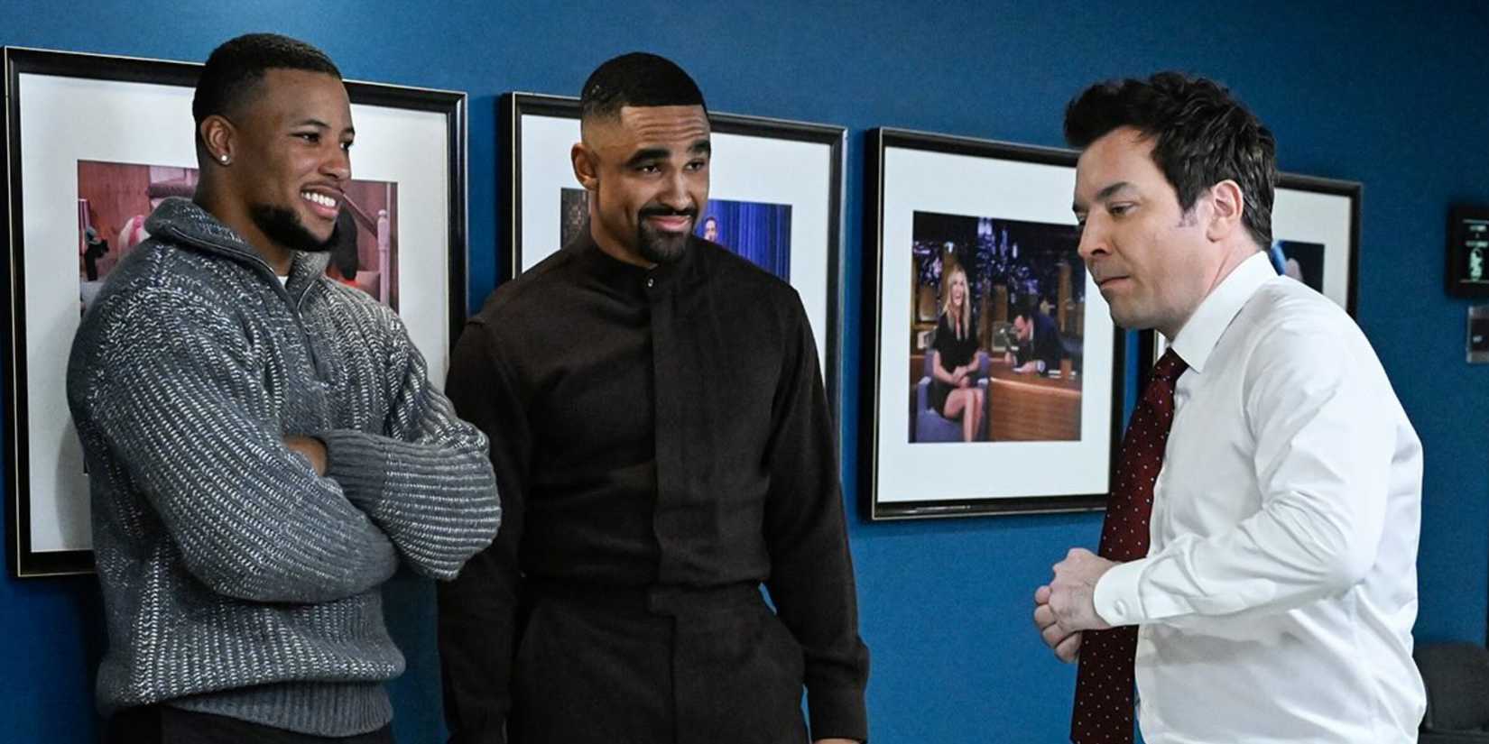 Philadelphia Eagles players Jalen Hurts and Saquon Barley with host Jimmy Fallon on The Tonight Show Starring Jimmy Fallon.
