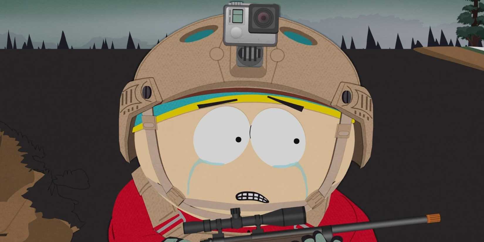 Eric Cartman (Trey Parker) holding an airsoft gun while crying.