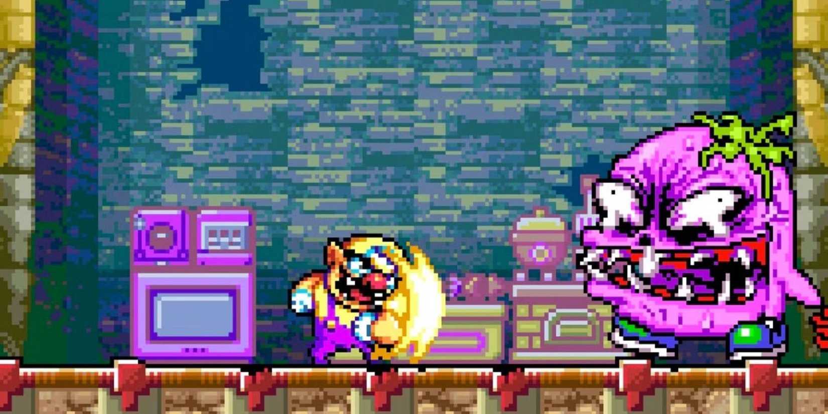 Wario shoulder charging towards a mutated monstrous pink tomato creature in 'Wario Land 4' (2001) on the Gameboy Advance