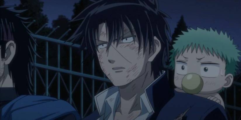 A beat up man with a baby on his shoulder in Beelzebub