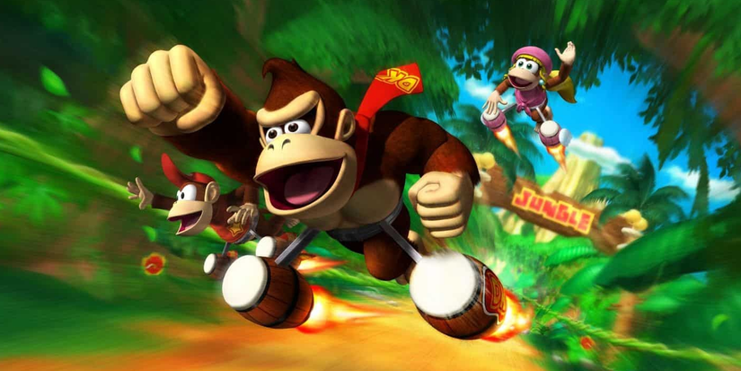 Donkey Kong, Diddy Kong, and Dixie Kong all racing with rocket-propelled bongo drums in 'Donkey Kong: Barrel Blast' for the Nintendo Wii