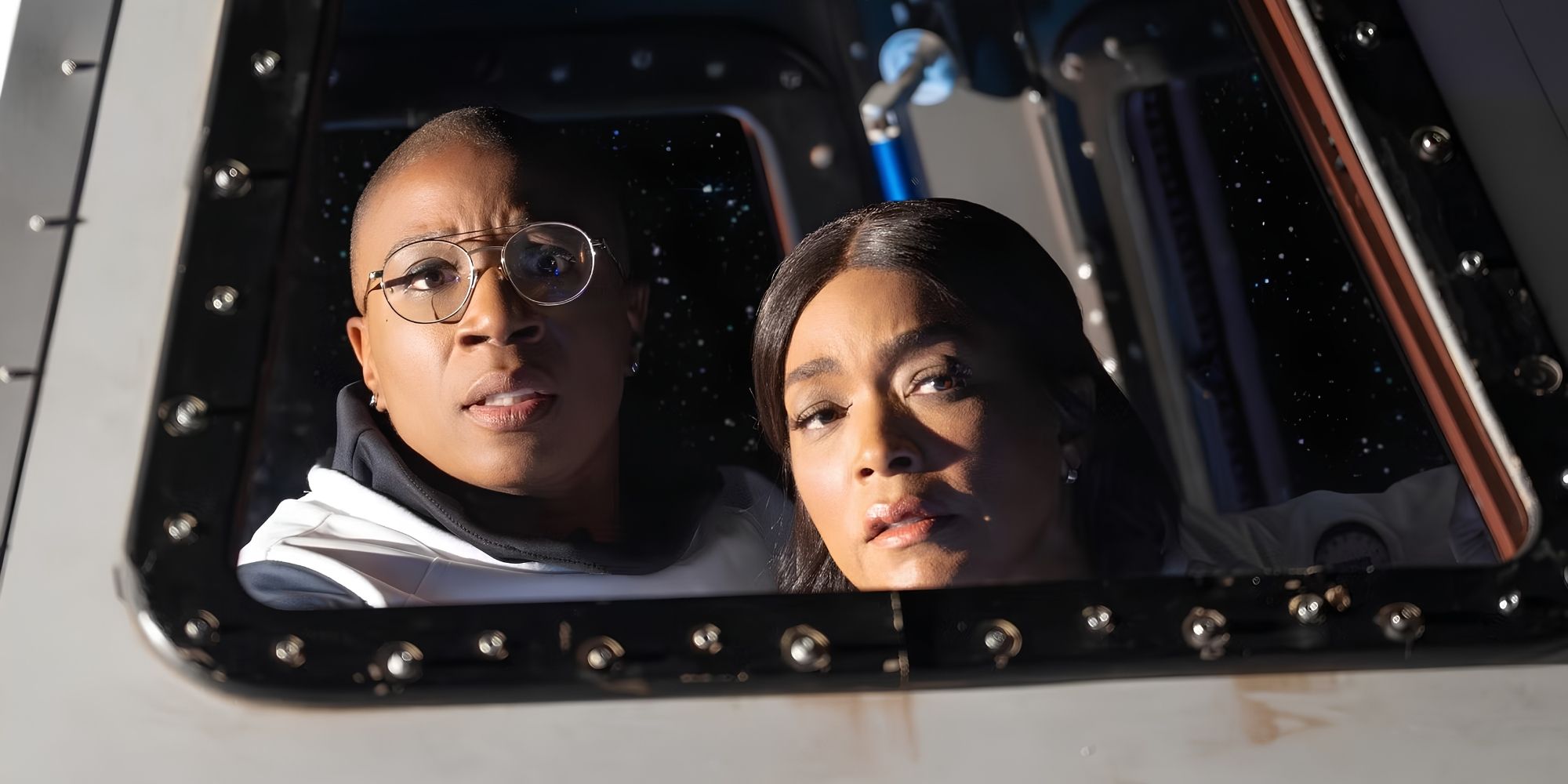 hen-aisha-hinds-athena-angela-bassett-look-out-spacecraft-window-9-1-1-season-9 '9-1-1' Needs To Say Goodbye to Its Biggest Gimmick