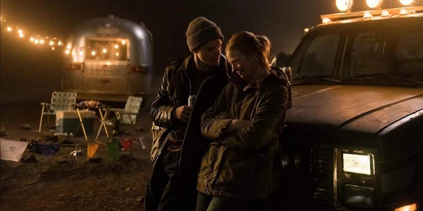 Karen Page (Deborah Ann Woll) and Todd Neiman (Will Stout) leaning against a truck in Daredevil Season 3.