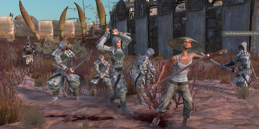 A bunch of warriors attacking a farmer in Kenshi