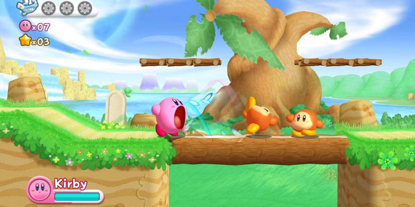 Kirby sucking up an enemy Waddle Dee in 'Kirby's Return to Dream Land' for the Nintendo Wii