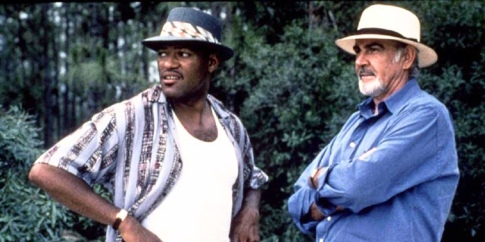 Laurence Fishburne standing with Sean Connery outside in Just Cause (1995)