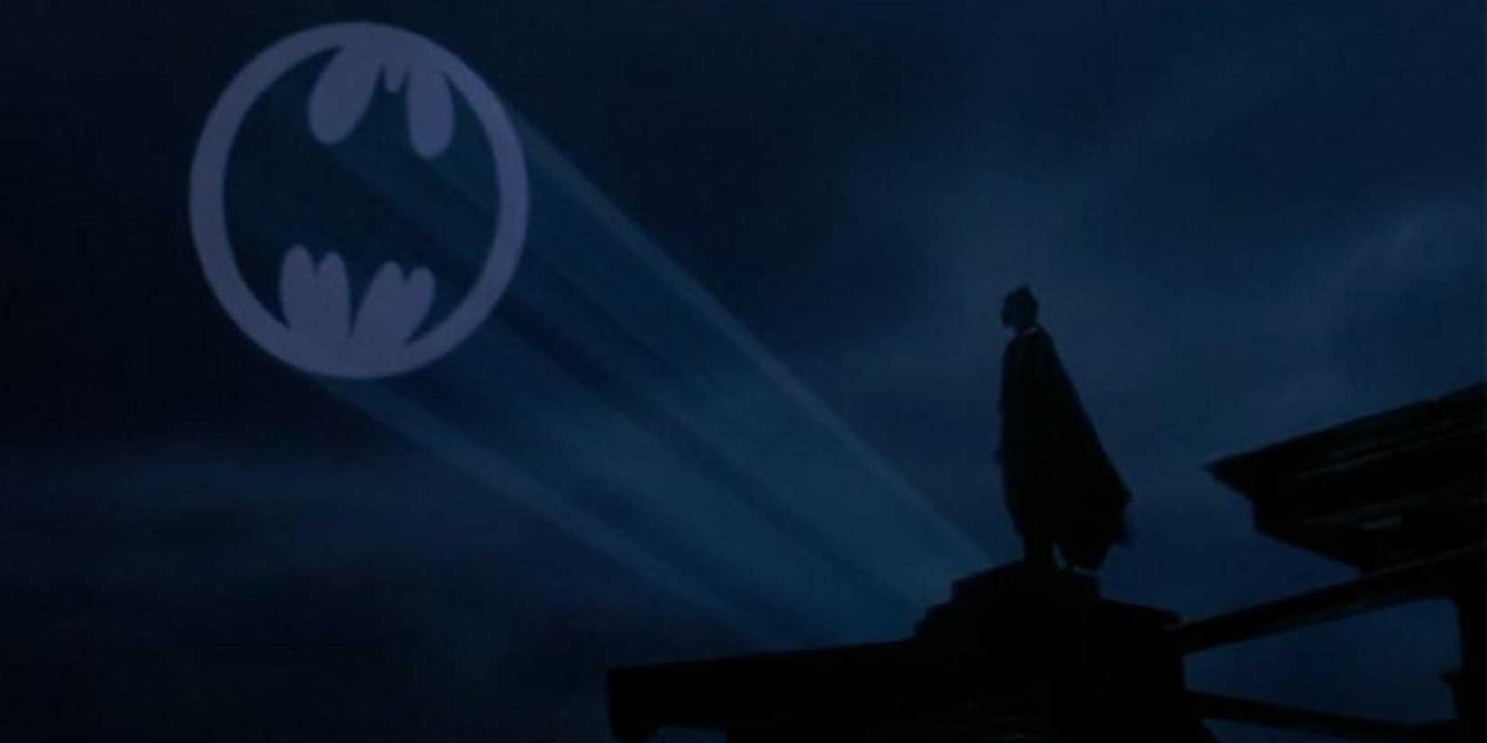Michael Keaton as Batman in front of Bat-Signal in 'Batman' (1989)