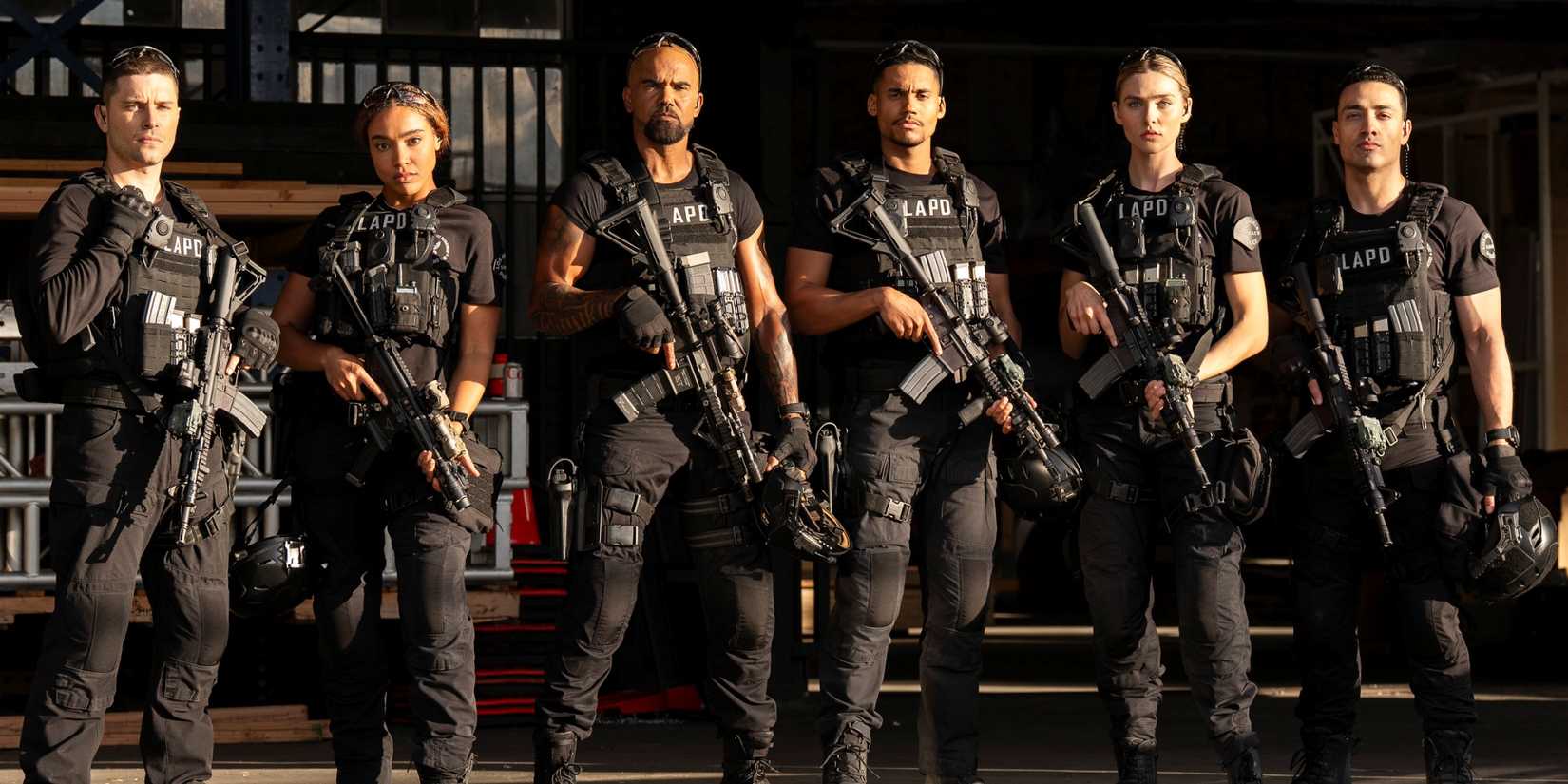 Shemar Moore as Hondo standing in full gear with his new team in S.W.A.T. Exiles