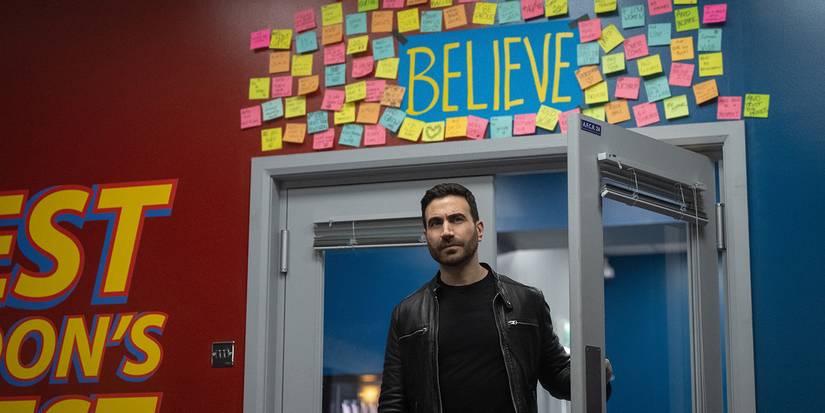 Roy walking into the locker room, the Believe sign above the door in Ted Lasso.