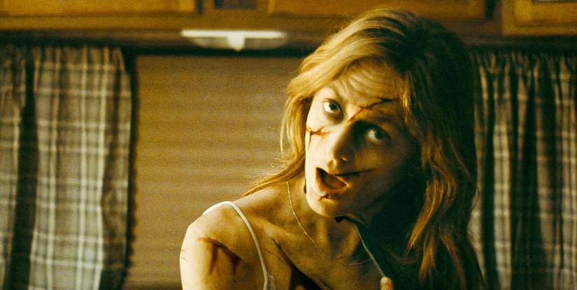 The Dark and the Wicked, Marin Ireland as Louise, looking dead as she slits her neck with a knife