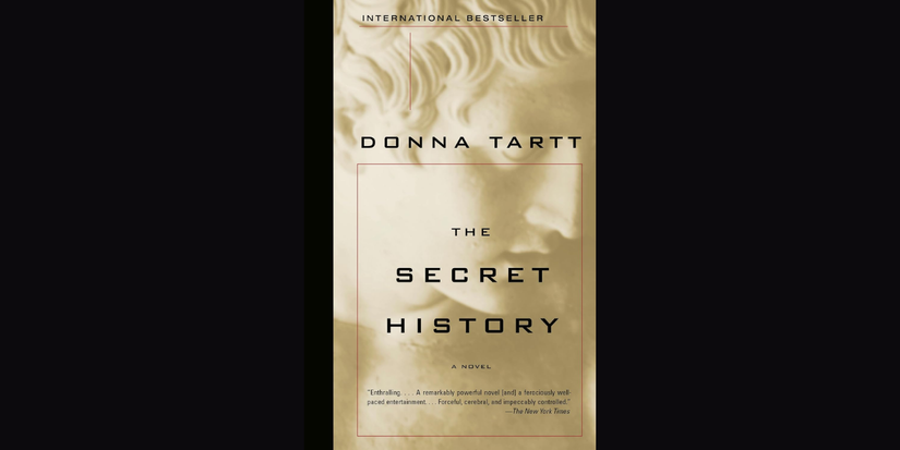 The Secret History by Donna Tartt book cover on black background.