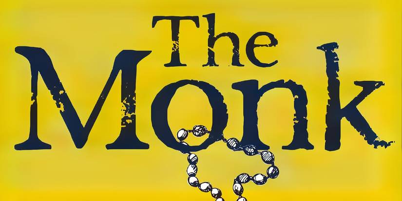 A close up of a yellow cover of The Monk, showing the title and a partial rosary