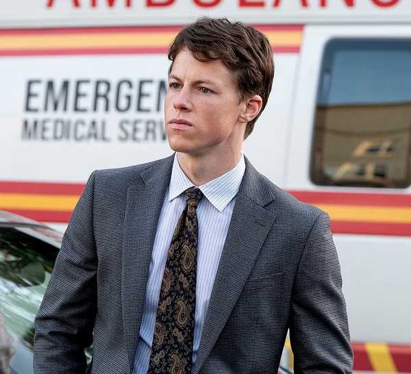 P.J. Byrne approaching Milo Callaghan by an ambulance in The Rainmaker