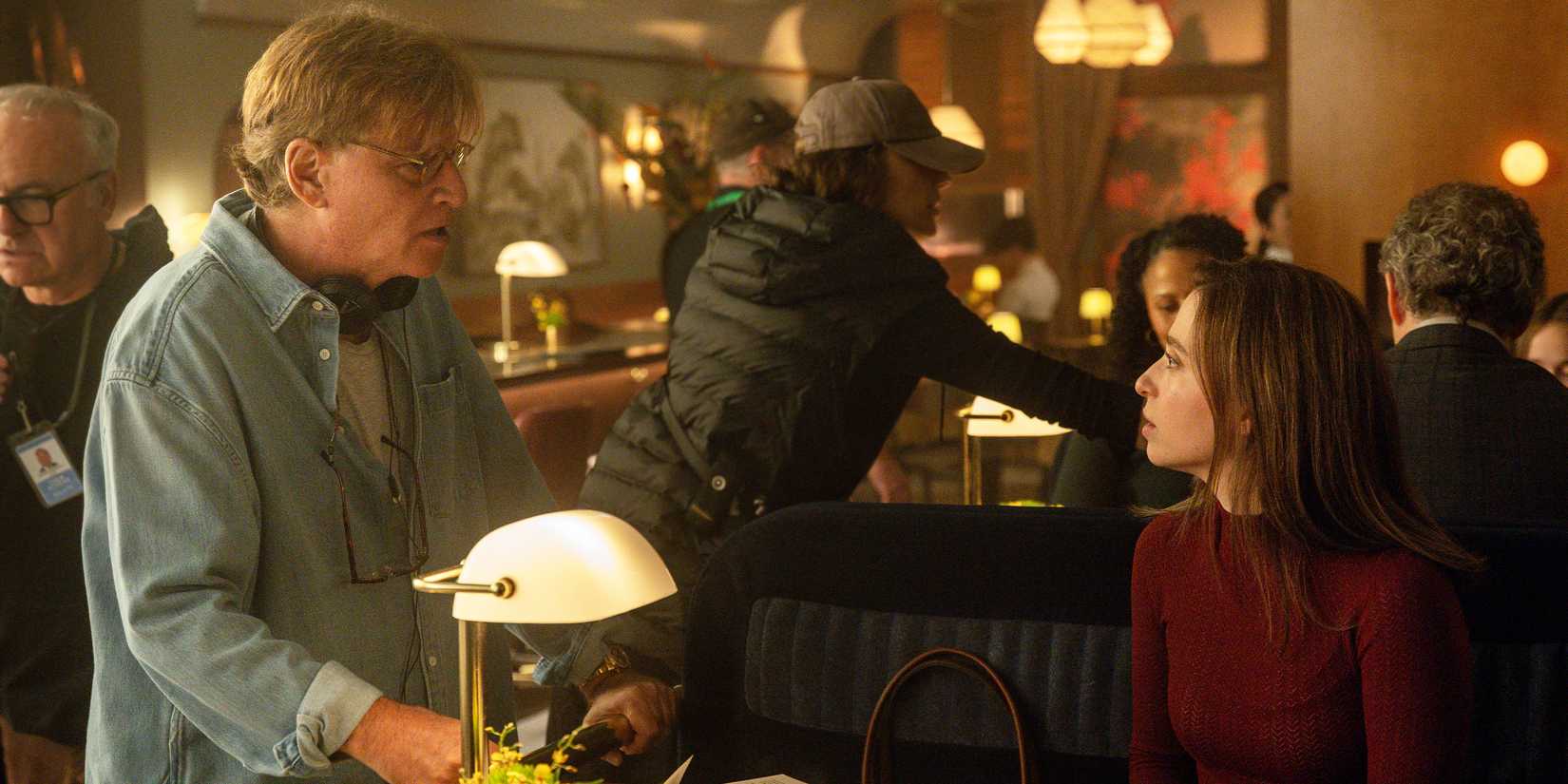 Aaron Sorkin on the set of The Social Reckoning with Mikey Madison.