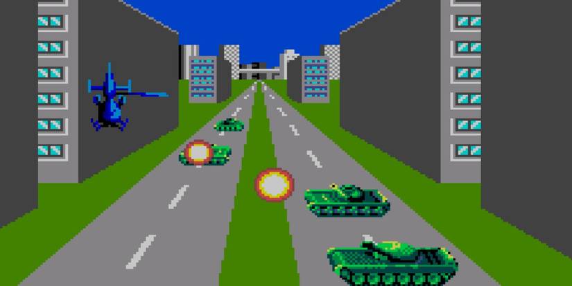 A helicopter being fired at by tanks in the Sega Master System port of 'Thunder Blade'
