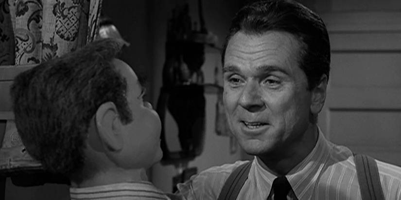 Jackie Cooper looking at a ventriloquist dummy in The Twilight Zone episode Caesar and Me