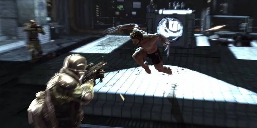 Logan launching toward an enemy soldier in 'X-Men Origins: Wolverine' the video game