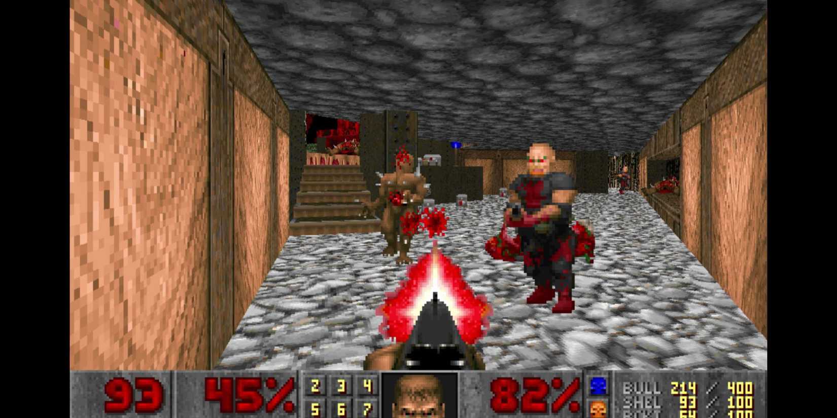 First-person view of someone shooting enemies in Doom