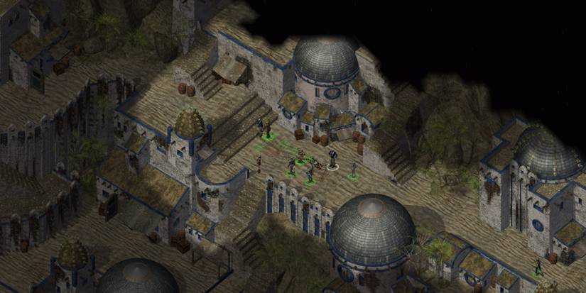 A shot of Baldur's Gate 2, a party in a desert town.