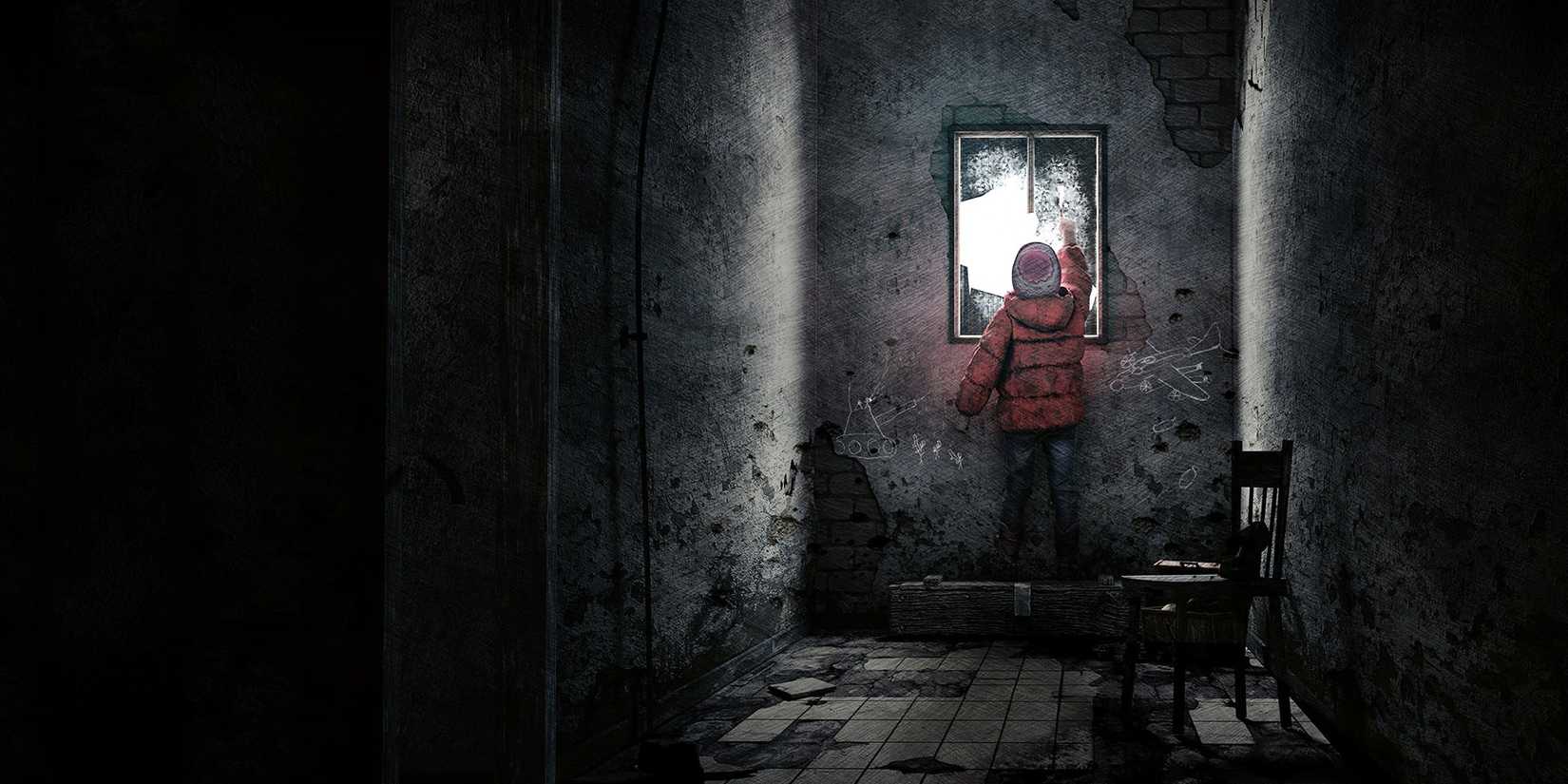 A young boy with a red jacket looking out the window in This War of Mine