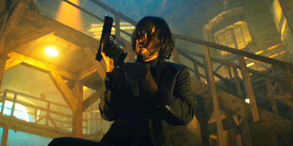 Keanu Reeves' John Wick reloads his gun in Ballerina