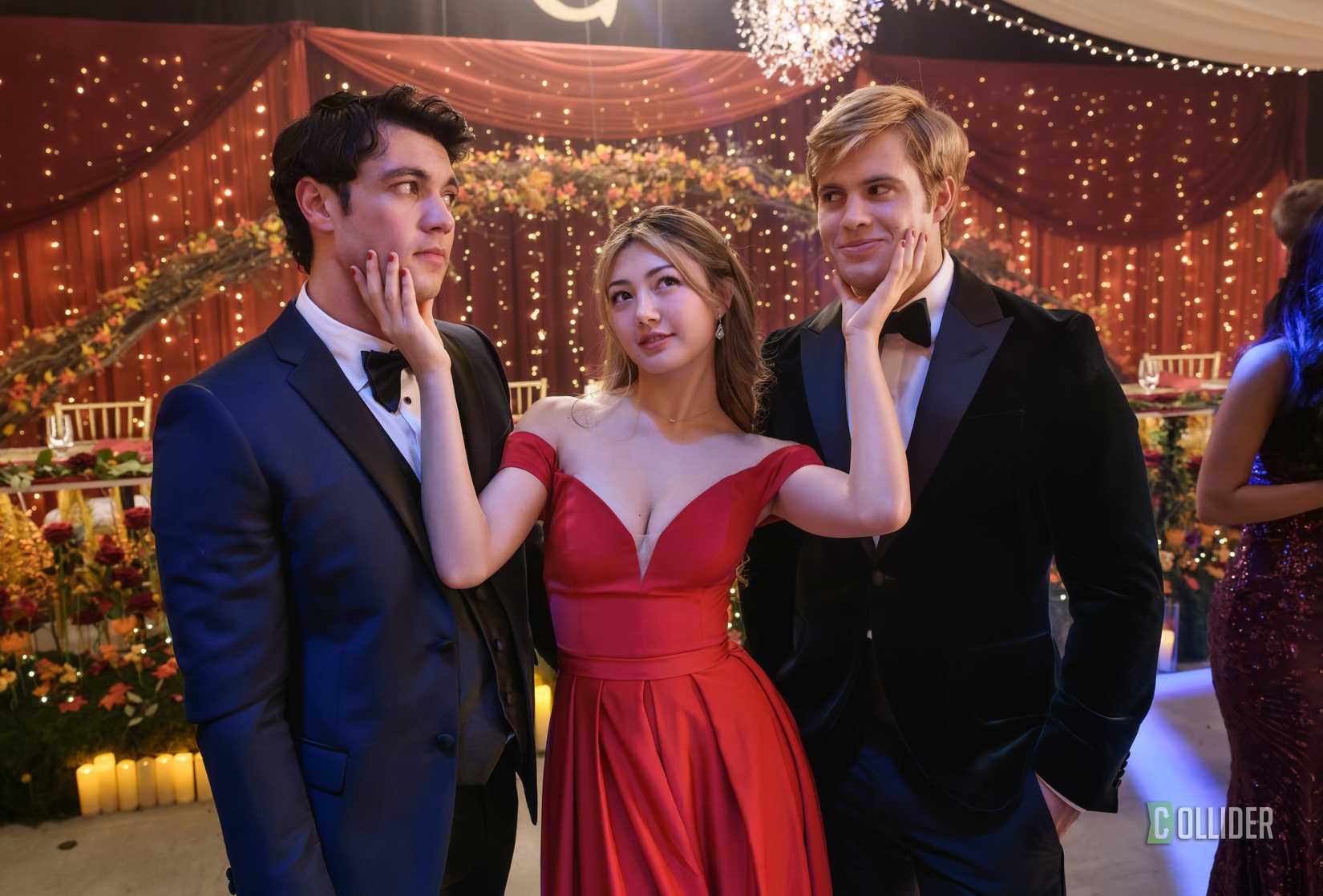 Kyle Clark and Sam Braun standing beside Miku Martineau at a dance as she grabs their faces in Crew Girl